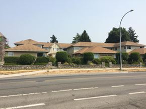Victoria apartment for rent - a house on the side of a street