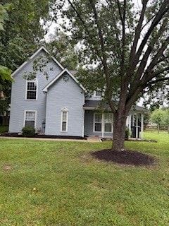 Oxon Hill apartment for rent - A house with a tree in front of it.