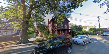 Marblehead apartment for rent - a car parked on a street in front of a house