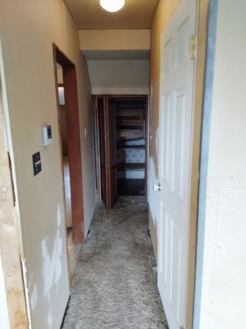 Victoria apartment for rent - a view of the hallway from the living room looking into the bedroom and closet