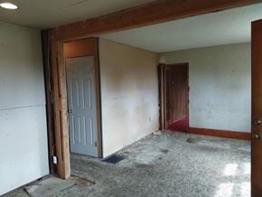 Victoria apartment for rent - an empty room with a white wall and a door
