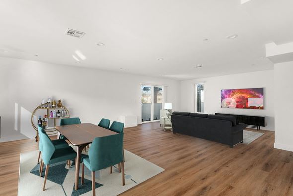 Los Angeles apartment for rent - a living room with a dining room table and a couch