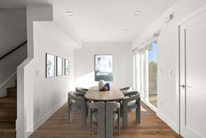 Los Angeles apartment for rent - a dining room with a wooden table and chairs