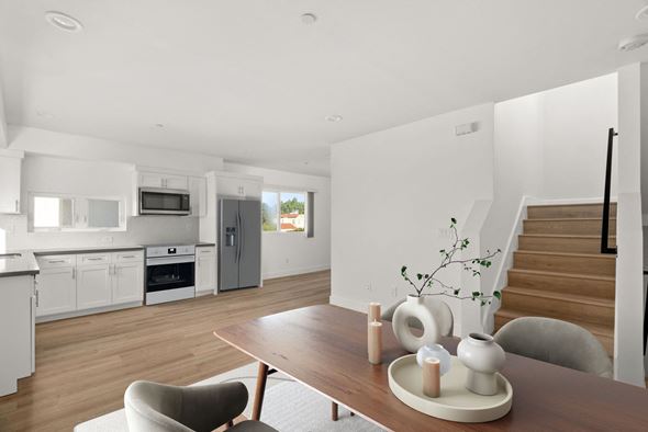 Los Angeles apartment for rent - A modern kitchen with a dining table and chairs.