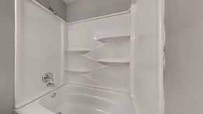 Clarksville house for rent - a small bathroom with a shower and a sink