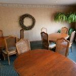 Arden Hills apartment for rent - a dining room with a wooden table and chairs