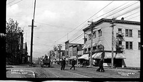 Vancouver apartment for rent - a black and white photo of people walking on a street