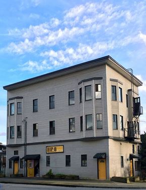 Vancouver apartment for rent - a white building on the side of a street