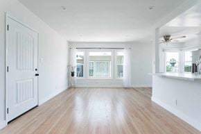 Los Angeles apartment for rent - an empty living room with white walls and wood floors