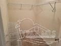 Pensacola house for rent - a white drawing of a house on a glass door