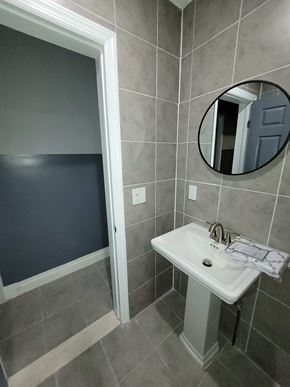 Elizabeth apartment for rent - A bathroom with a sink and mirror.