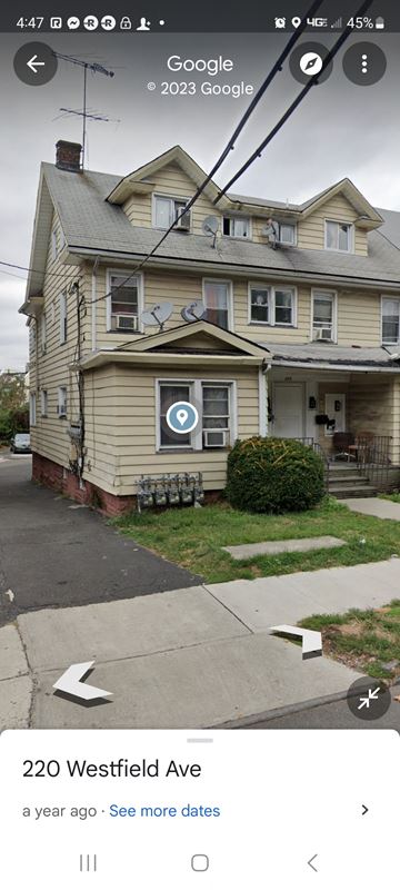 Elizabeth apartment for rent - a house with a sign on the side of a street