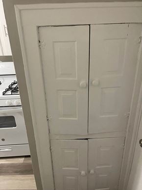 Akron apartment for rent - A white door with a handle is open.
