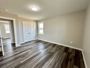 Fountain Inn house for rent - a living room with wood floors and a white door