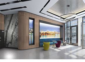 Long Island City apartment for rent - a rendering of a lobby with yellow chairs and a view of a bridge