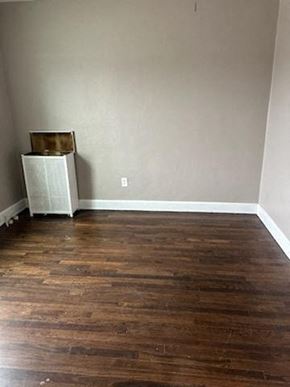 Cleveland Heights apartment for rent - a room with wooden floors and a refrigerator