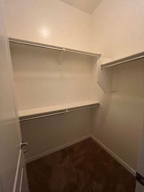 Buckeye house for rent - a small room with a closet and shelves