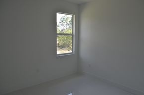 Lehigh Acres house for rent - an empty room in a house with a window