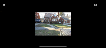 Detroit apartment for rent - the view of a house from a video screen