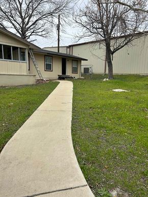 Killeen house for rent - a sidewalk in front of a house