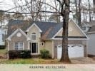 Cary house for rent - the appraised value of a home is shown in a street photo