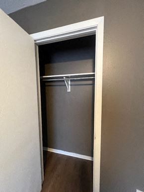 Hattiesburg apartment for rent - an empty closet with a door open in a room
