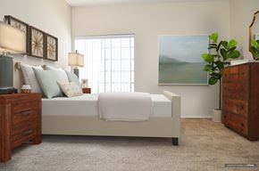 Burbank apartment for rent - a bedroom with a bed and a dresser and a painting on the wall