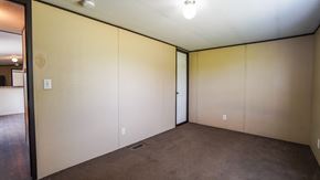 Royse City apartment for rent - A room with beige walls and carpet.