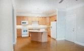 Raleigh apartment for rent - a large kitchen with an island in the middle of it