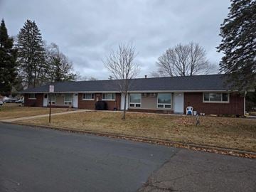Menomonie house for rent - a view of the front of a house from the street
