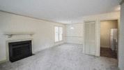 Raleigh apartment for rent - an empty living room with a fireplace