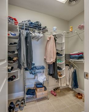 Bristol house for rent - a walk in closet with a lot of clothes and shoes