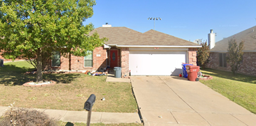 Royse City house for rent - a house with a driveway and a garage door