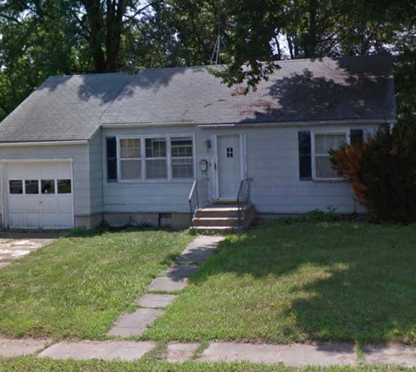 Windsor house for rent - a white house with a sidewalk in front of it