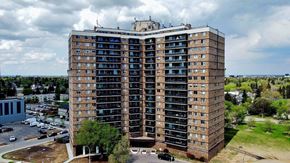 Edmonton apartment for rent - an aerial view of a tall building in a city