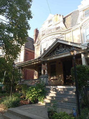Philadelphia apartment for rent - the front of a building with stairs in front of it