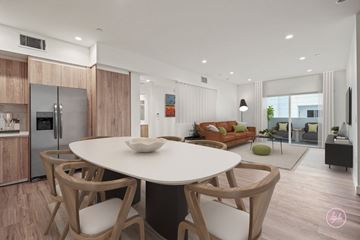 Los Angeles apartment for rent - a kitchen and living room with a white table and chairs