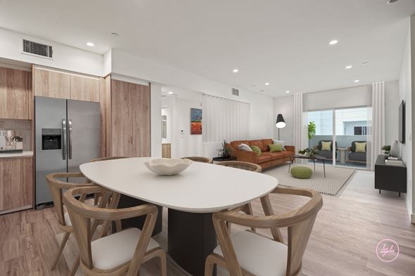 Los Angeles apartment for rent - a kitchen and living room with a white table and chairs