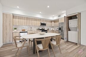 Los Angeles apartment for rent - A modern kitchen with a table and chairs.