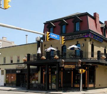 Buffalo apartment for rent - a building on the corner of a street with a traffic light