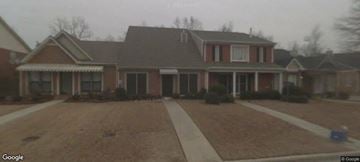 Decatur apartment for rent - A house with a red brick exterior and a grey roof.