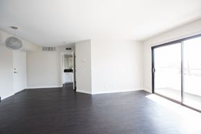 Los Angeles apartment for rent - an empty living room with white walls and a large window
