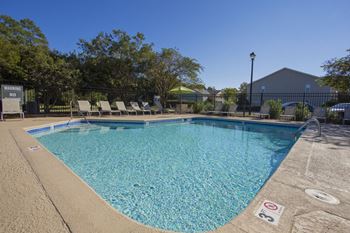 Saltwater swimming pool with expansive sundeck