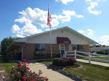 Fort Wayne apartment for rent - a building with an flag in front of it