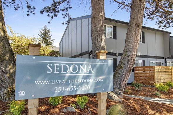 Tacoma apartment for rent - a sign in front of a house
