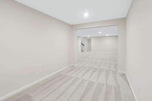 New Richmond house for rent - the living room and dining room in a new home with white walls and carpet