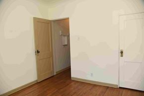 Trinidad house for rent - an empty room with a door and a closet