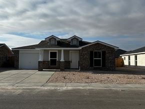 Odessa house for rent - A house with a grey roof and a white garage door.