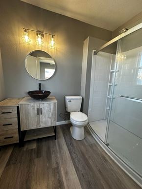 Abilene apartment for rent - a bathroom with a toilet and a sink and a shower