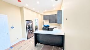 Chicago apartment for rent - a kitchen with a counter top and a refrigerator